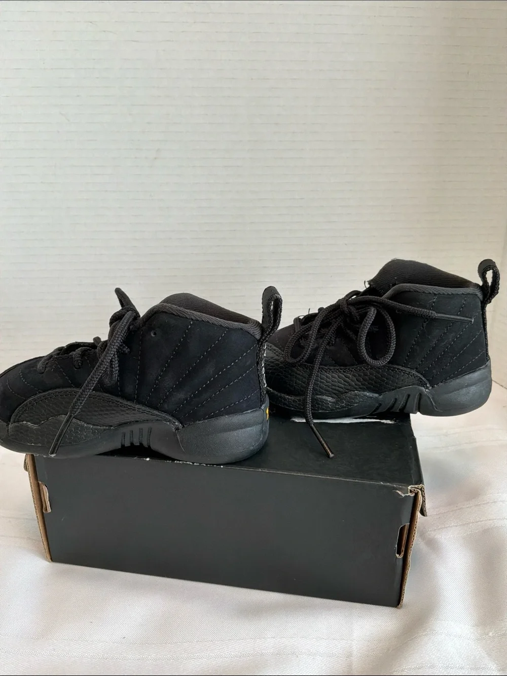 Jordan Kids Black Retro 12 Sneakers size 6c with gold sticker with box
